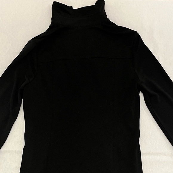 Black collar dress.  Sleeves are three quarter.  Small slits up the sides. - Picture 2 of 3